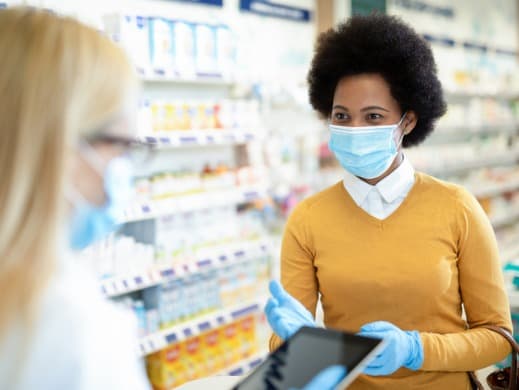 Woman at Pharmacy with Masks