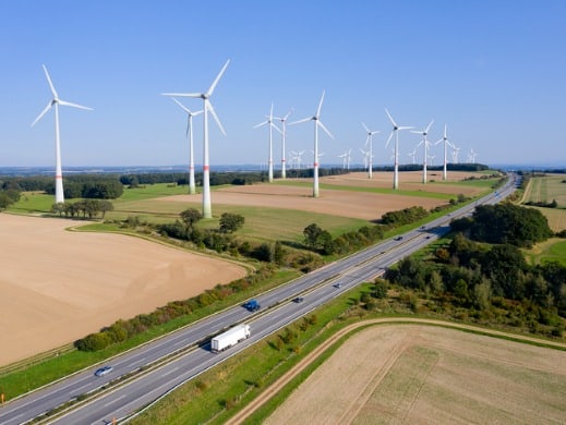Wind turbines near highway